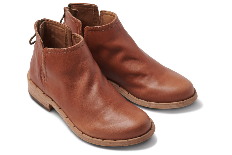 Falcon leather booties in cognac - angle shot