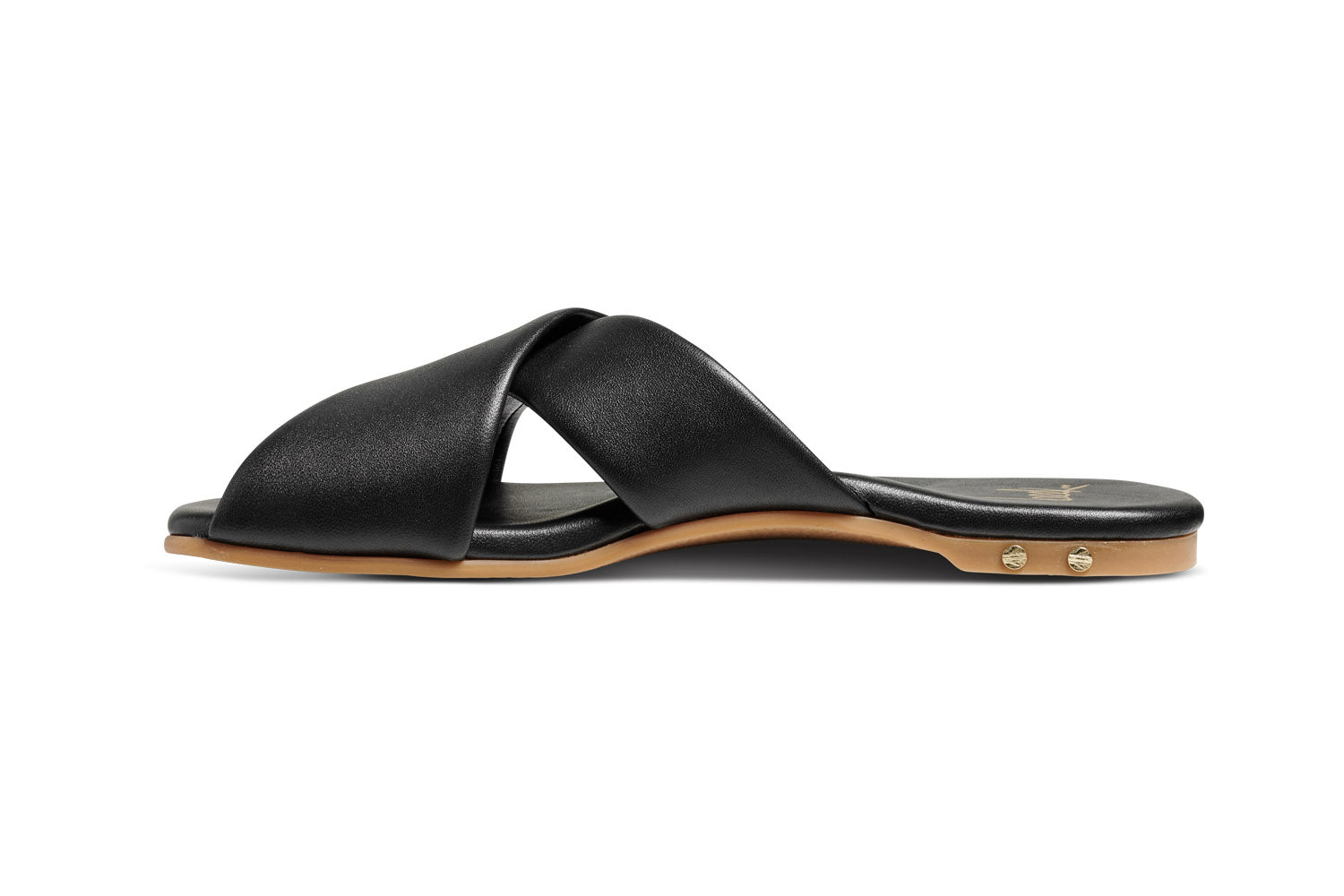 Fernbird leather slide sandals in black - product side shot