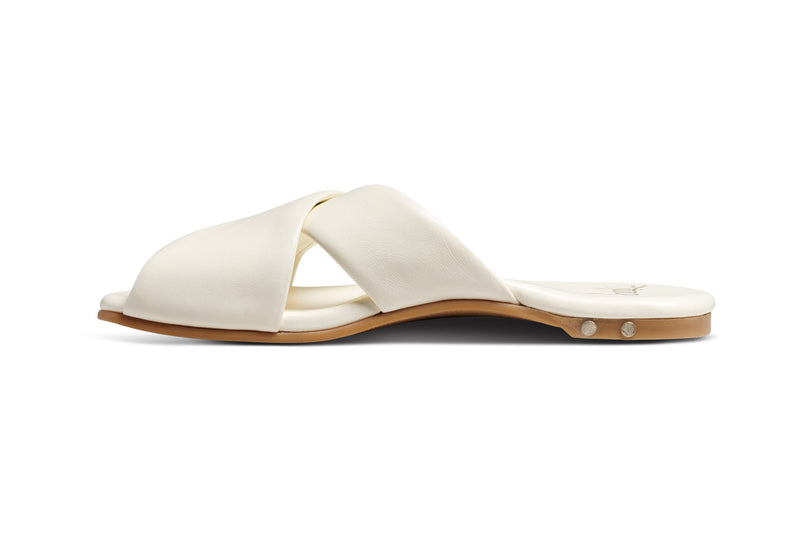 Fernbird leather slide sandal in vanilla - product side shot