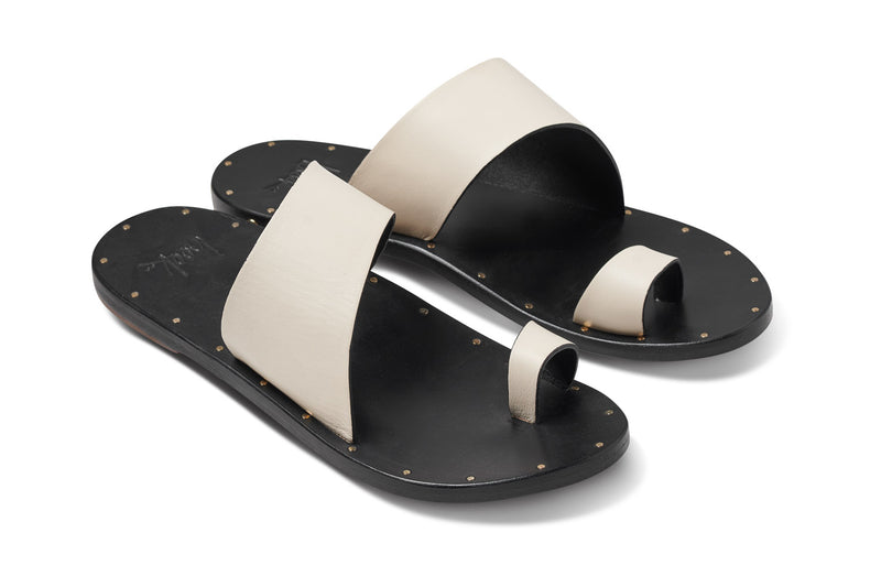 Finch leather toe ring sandal in eggshell/black - angle shot