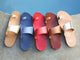 Group shot of Finch leather toe-ring sandals in platinum/honey, navy, lipstick, tan, high shine silver.
