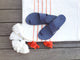 Finch leather toe-ring sandals in navy on towel