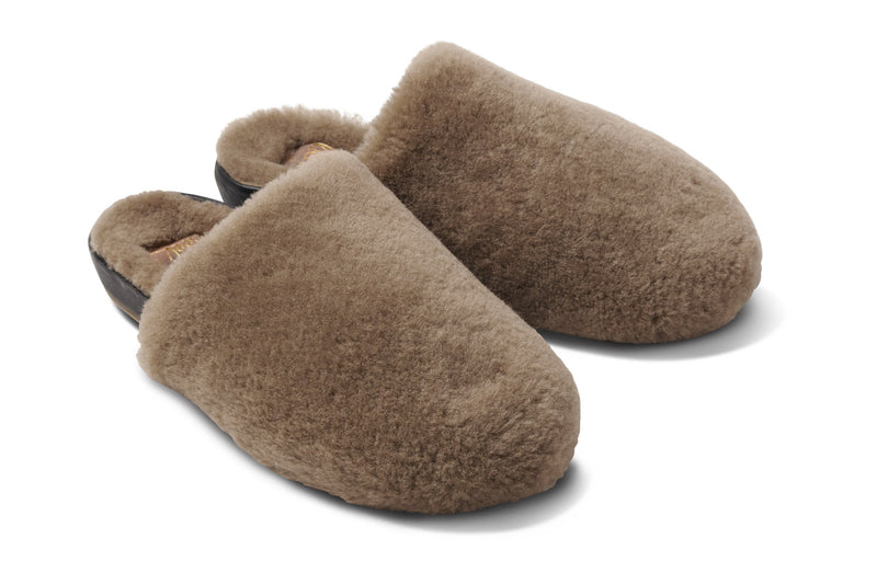 Flufftail shearling mules in bronze/black - angle shot