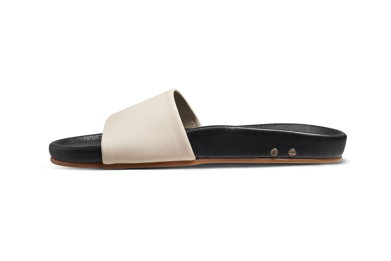 Gallito leather slide sandal in eggshell/black - side shot