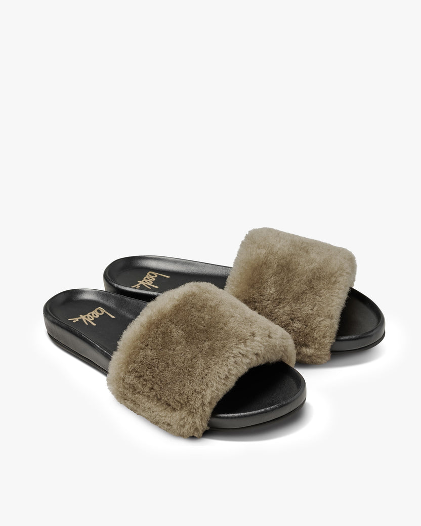 Gallito Más Shearling slide sandals in bronze/black - product angle shot
