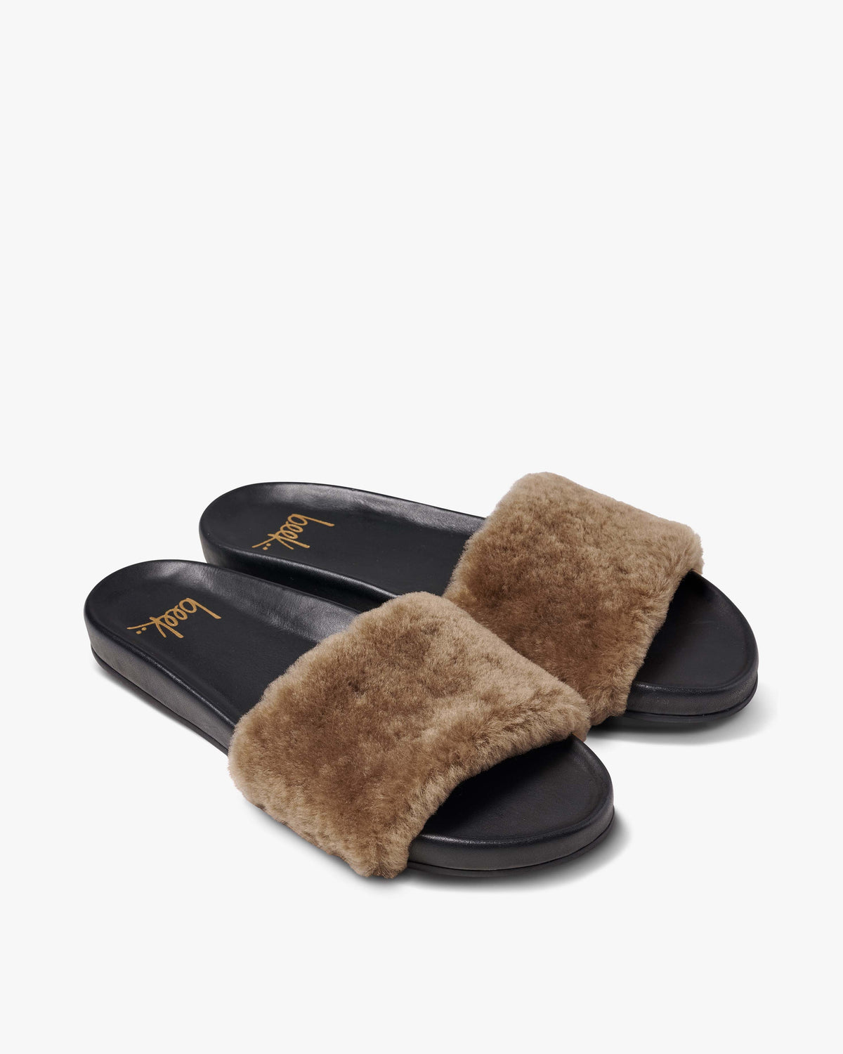 Gallito Más Shearling slide sandals in bronze/black - product angle shot