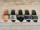 Group shot of Gallito Mas Shearling in honey/tan, bronze/black, army/black with Gallito Shearling in black and ivy.