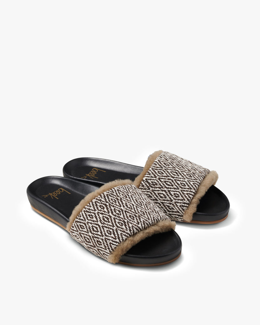Gallito Shearling leather slide sandals in multi/black - product angle shot