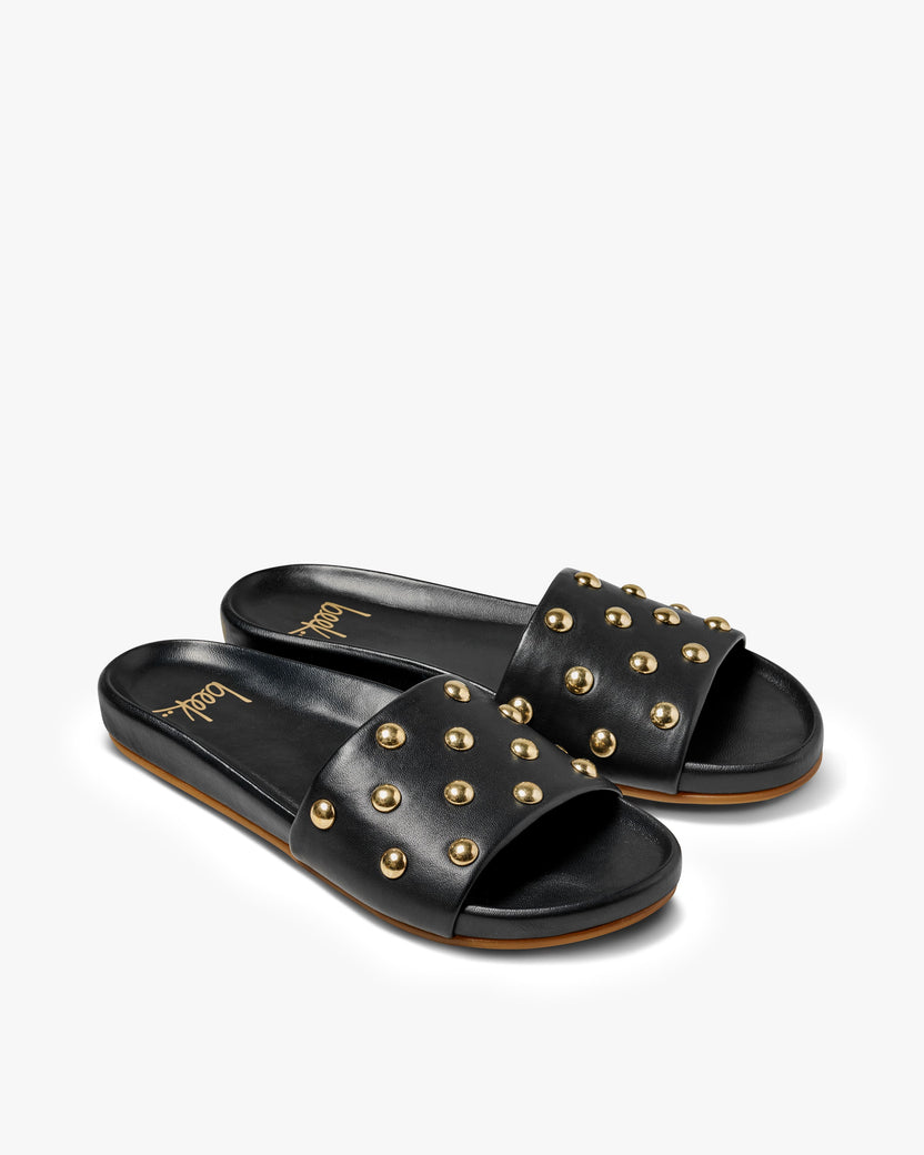 Gallito Stud leather slide sandal in black - product angle shot