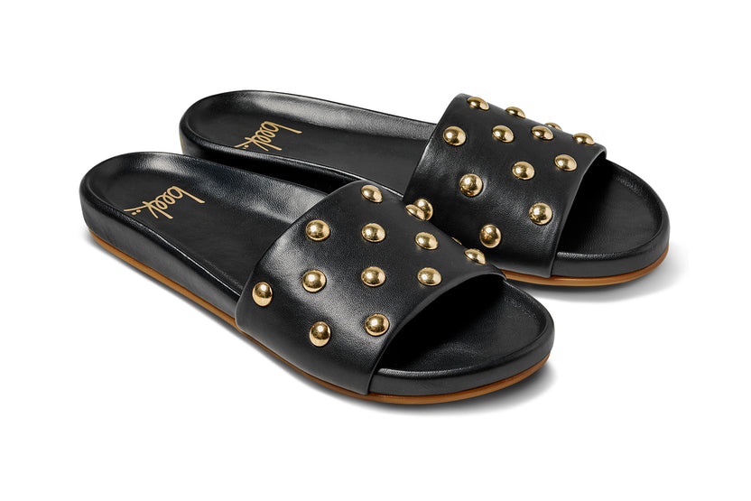 Gallito Stud leather slide sandal in black - product angle shot