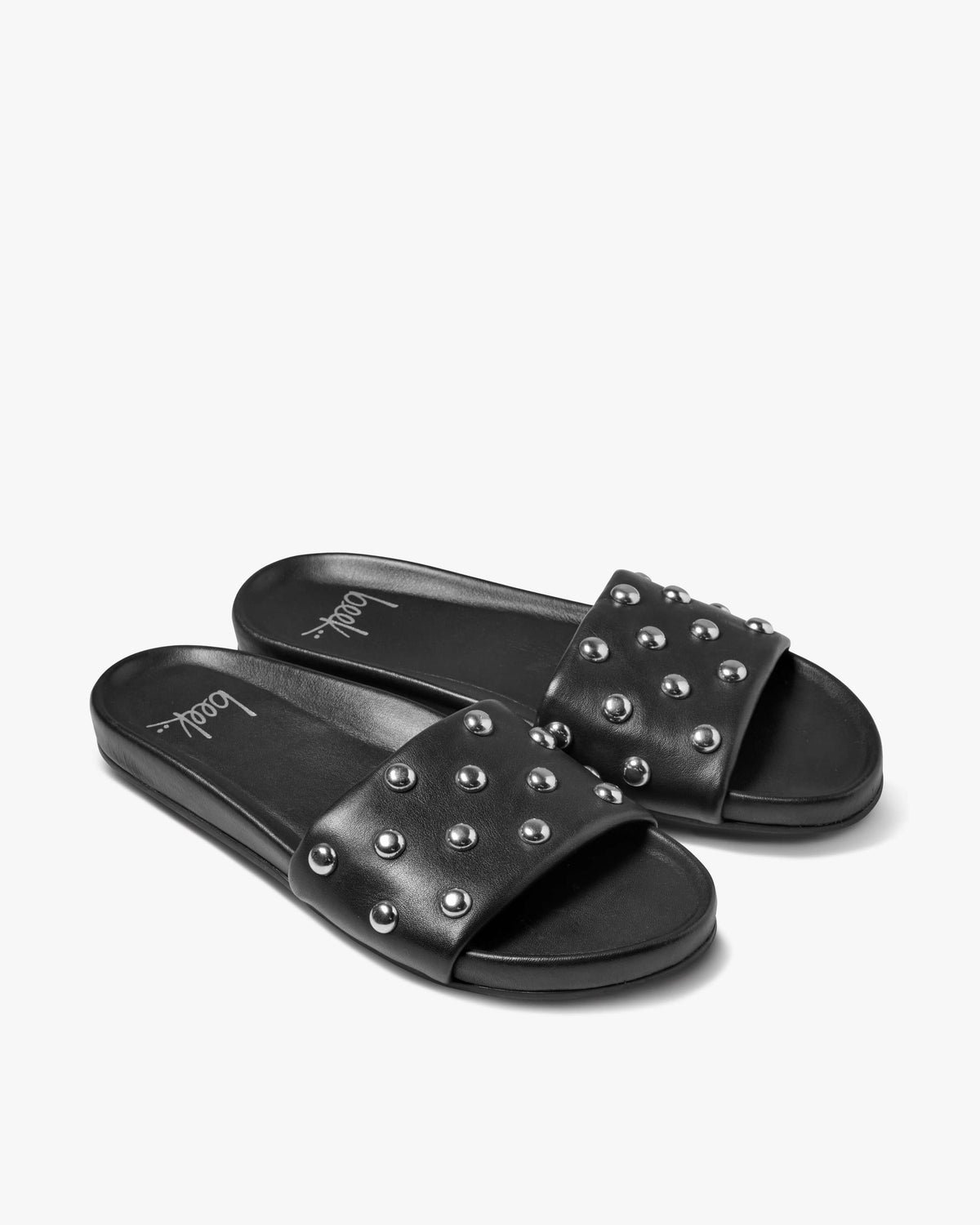 Gallito Stud leather slide sandals in black with silver studs - product angle shot