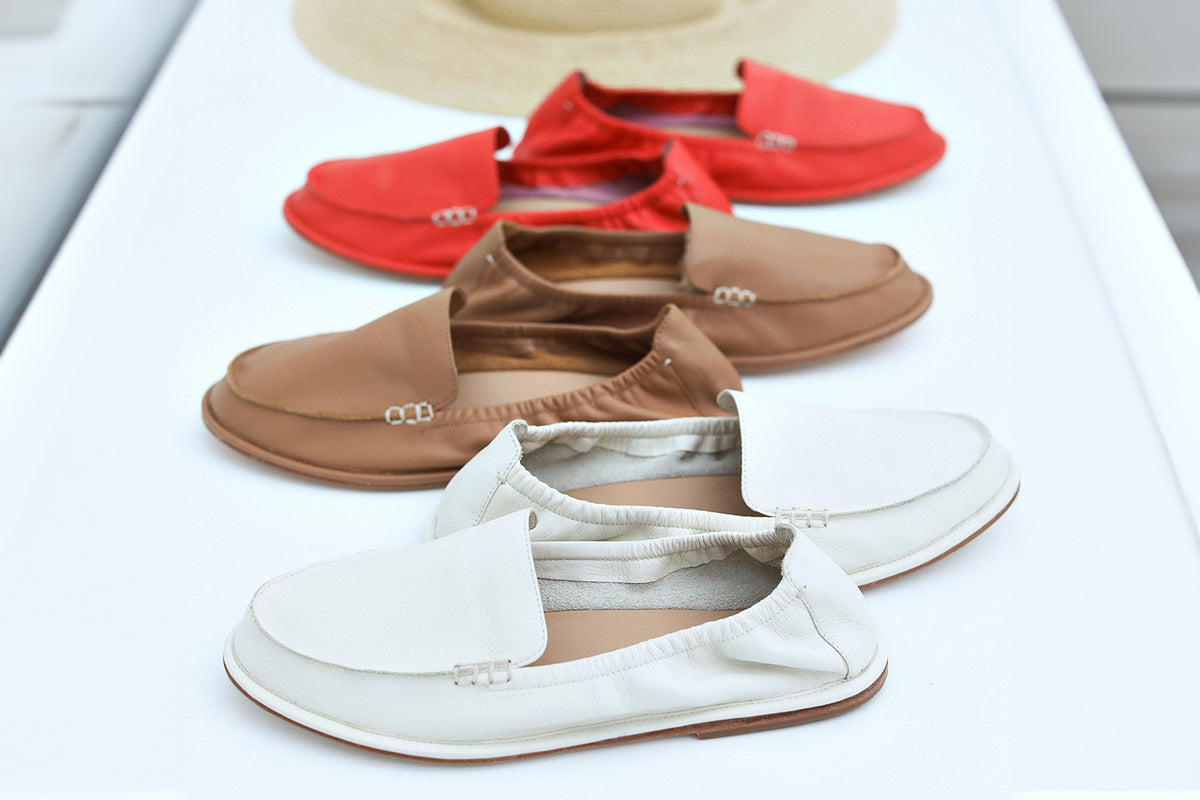 Group shot of Griffin leather loafers in vanilla, honey, tomato.