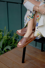 Woman wearing Gull leather platform sandal in cognac
