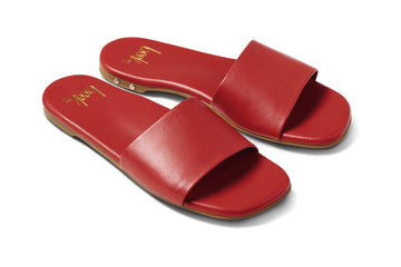 Honeybird leather slide sandals in red - angle shot