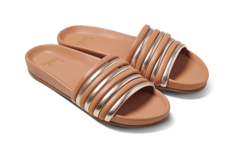 Hoopoe leather slide sandal in gold/honey - angle shot