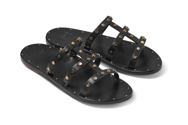 'I'iwi leather sandals in black - angle shot
