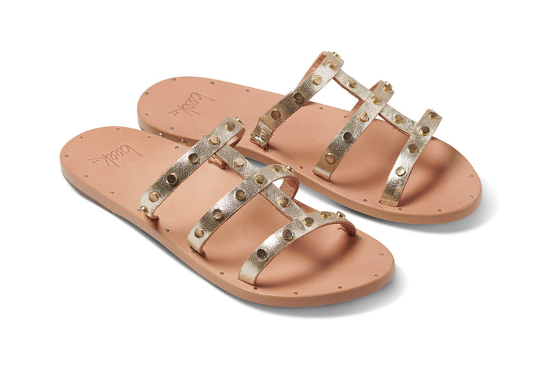 'I'iwi leather sandals in platinum/beach - angle shot