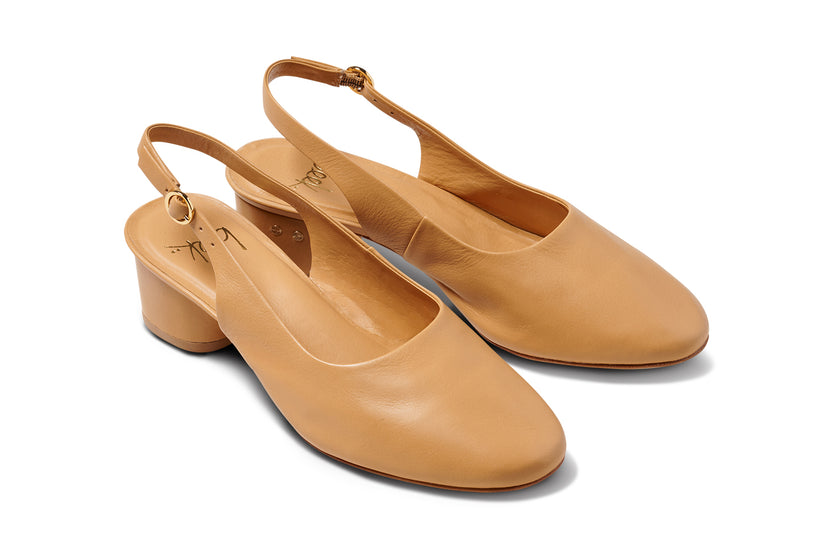 Lora leather heeled mules in beach - product angle shot