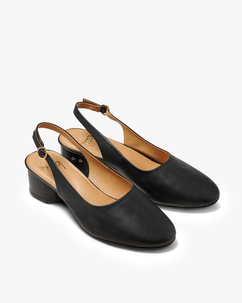 Lora leather heeled mules in black - product side shot