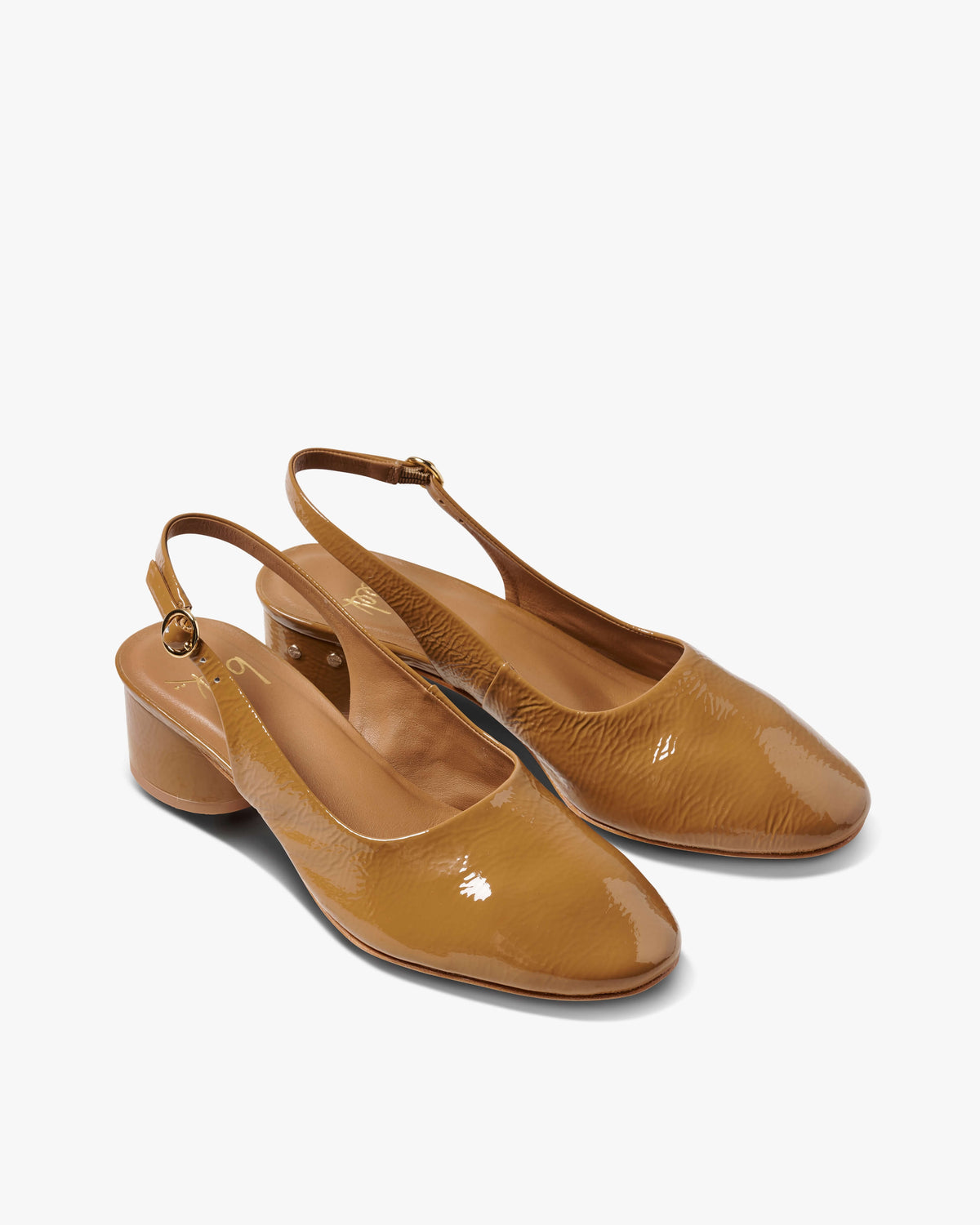 Lora patent leather heeled sling back shoes in latte - product angle shot