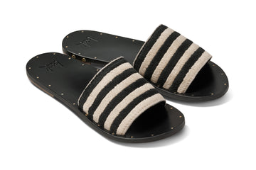 Lovebird leather embroidered slide sandal in black stripe - product angle shot