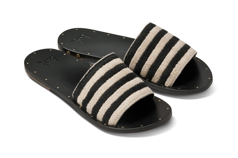 Lovebird leather embroidered slide sandal in black stripe - product angle shot