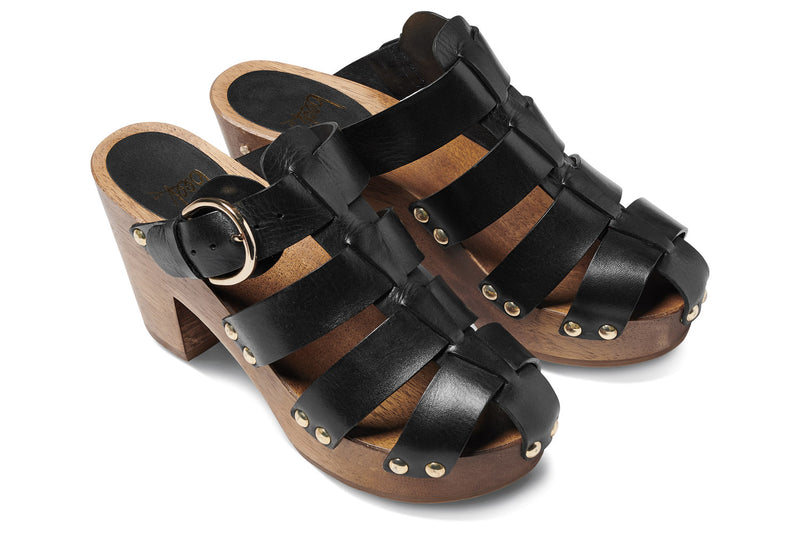 Magpie leather heeled clogs in black - angle shot