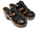 Magpie leather heeled clogs in black - angle shot