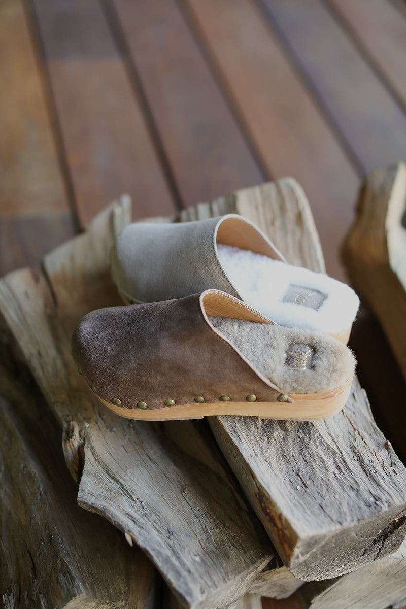 Mallard Shearling clogs in pecan and stone.