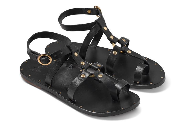 Miner leather studded sandals in black - angle shot