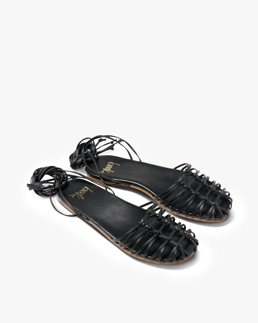 Minla leather ankle wrap sandal in black - product angle shot