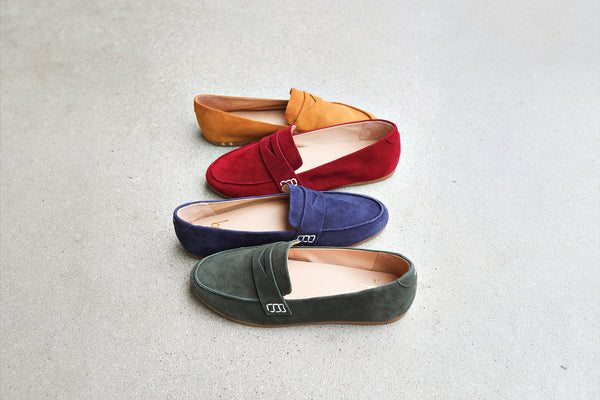Group shot of Moorhen suede loafers in ivy, navy, port, caramel.