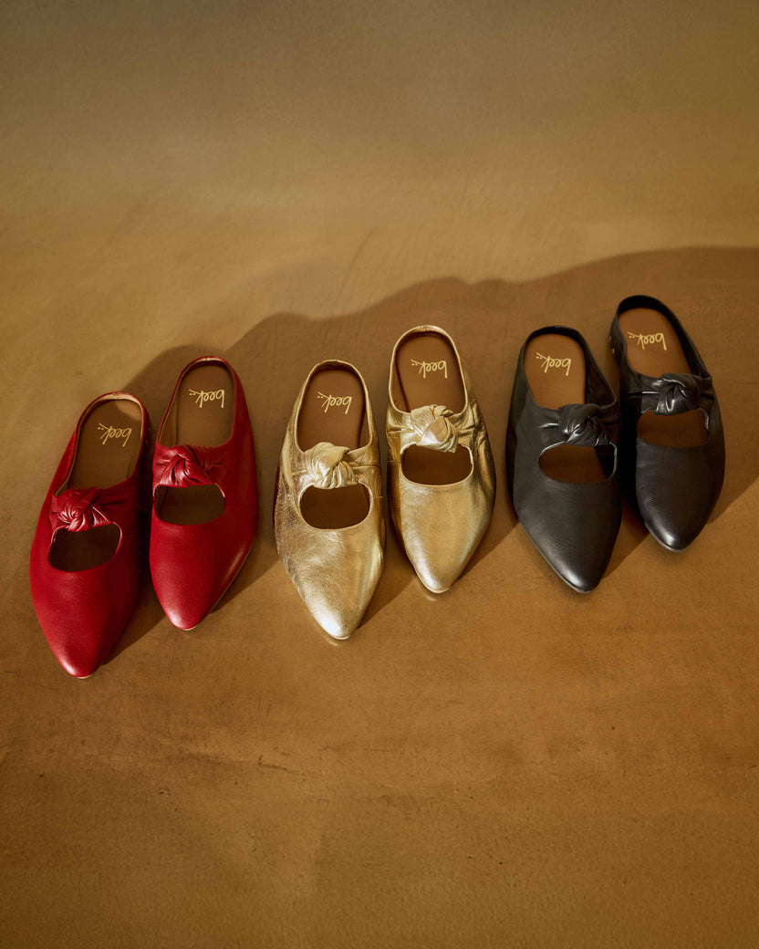 Group shot of Noddy leather ballet mules in crimson, gold, black