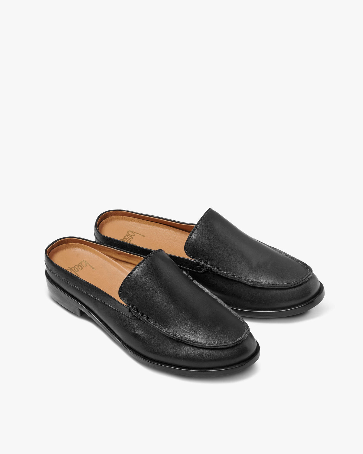 Owlet leather backless loafer in black - product angle shot
