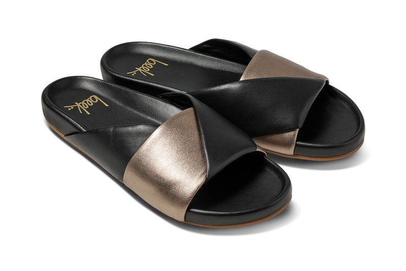 Paloma leather slide sandal in bronze/black - product angle shot