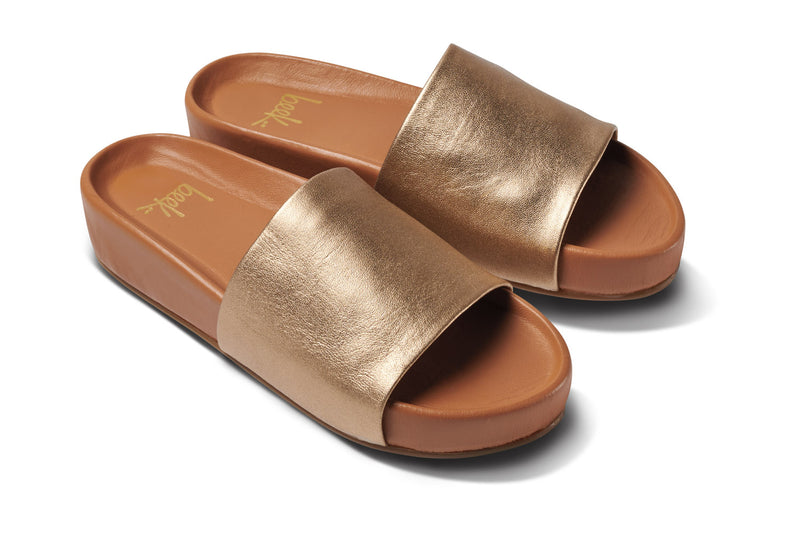 Pelican leather platform sandal in gold/honey - angle shot
