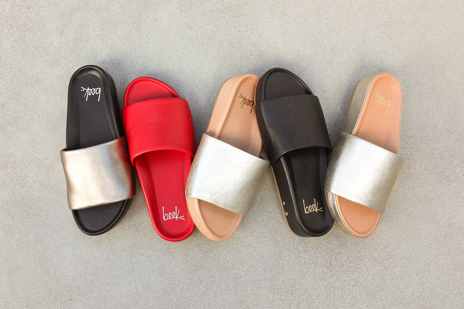 Group shot of Pelican leather platform sandals in bronze/black, lipstick, platinum/beach, black, and platinum.