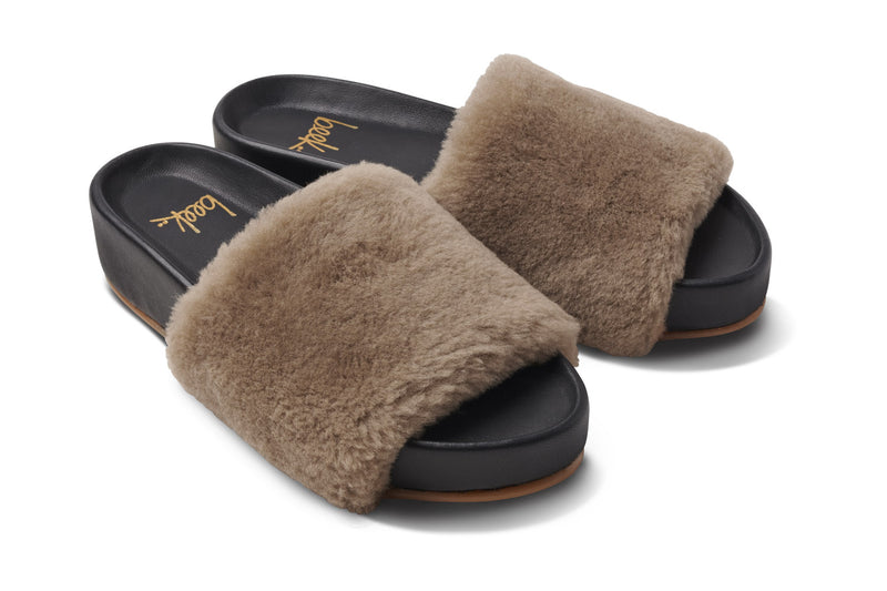 Pelican shearling sandal in bronze/black - angle shot