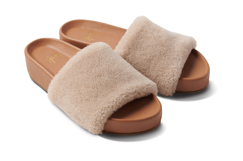 Pelican Shearling platform slide sandal in natural/honey - angle shot