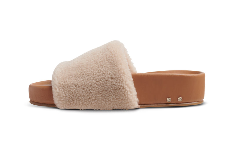 Pelican Shearling platform slide sandal in natural/honey - side shot