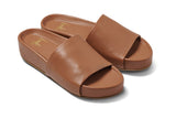 Pelican leather platform sandal in tan - angle shot