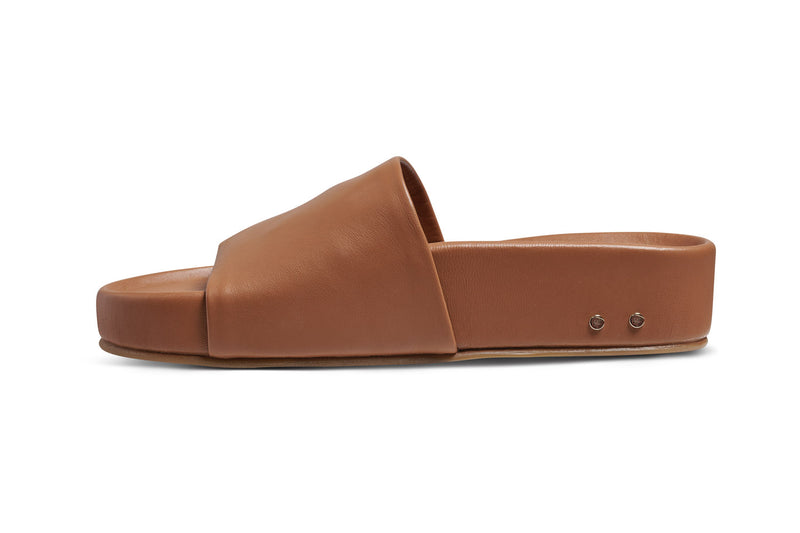 Pelican leather platform sandal in tan - side shot