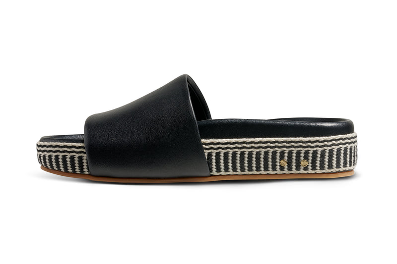 Pelican Textile wrapped leather platform sandal in black - product side shot