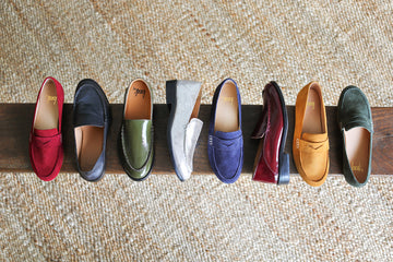 Group shot of Moorhen suede loafers in port, navy, caramel, ivy with Pepper loafers in black. olive, silver, wine.