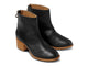 Pheasant leather boots in black/tan - product angle shot