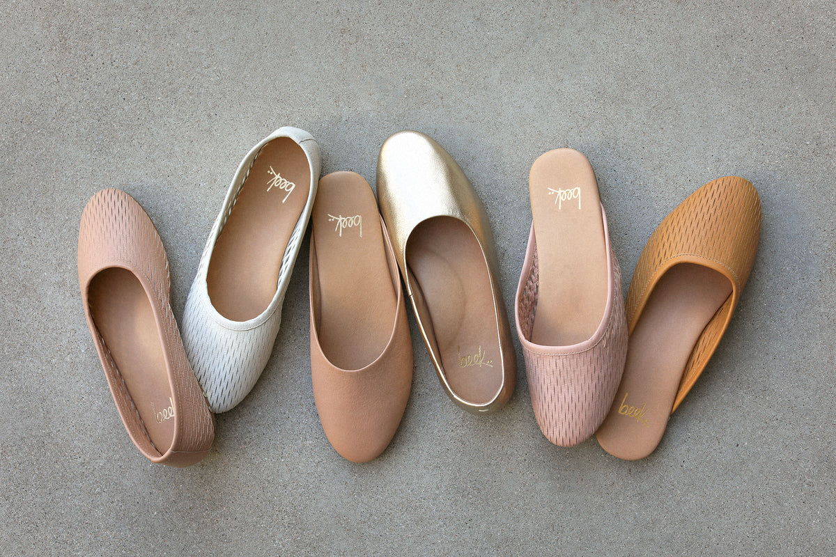 Group shot of Swiftlet Perforated leather blalet slippers in beach and vanilla, Phoebe leather ballet mule in beach, Swiftlet leather ballet slipper in gold, Phoebe Perforated leather ballet mule in blush and honey.