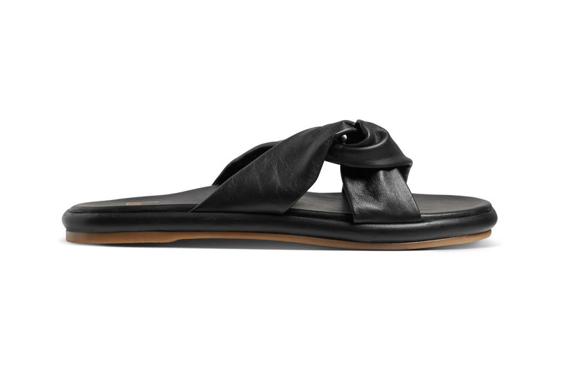 Piculet twisted leather slide sandals in black - side shot