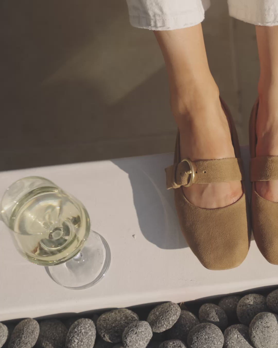 Video of woman wearing Cardinal suede ballet flat in toffee