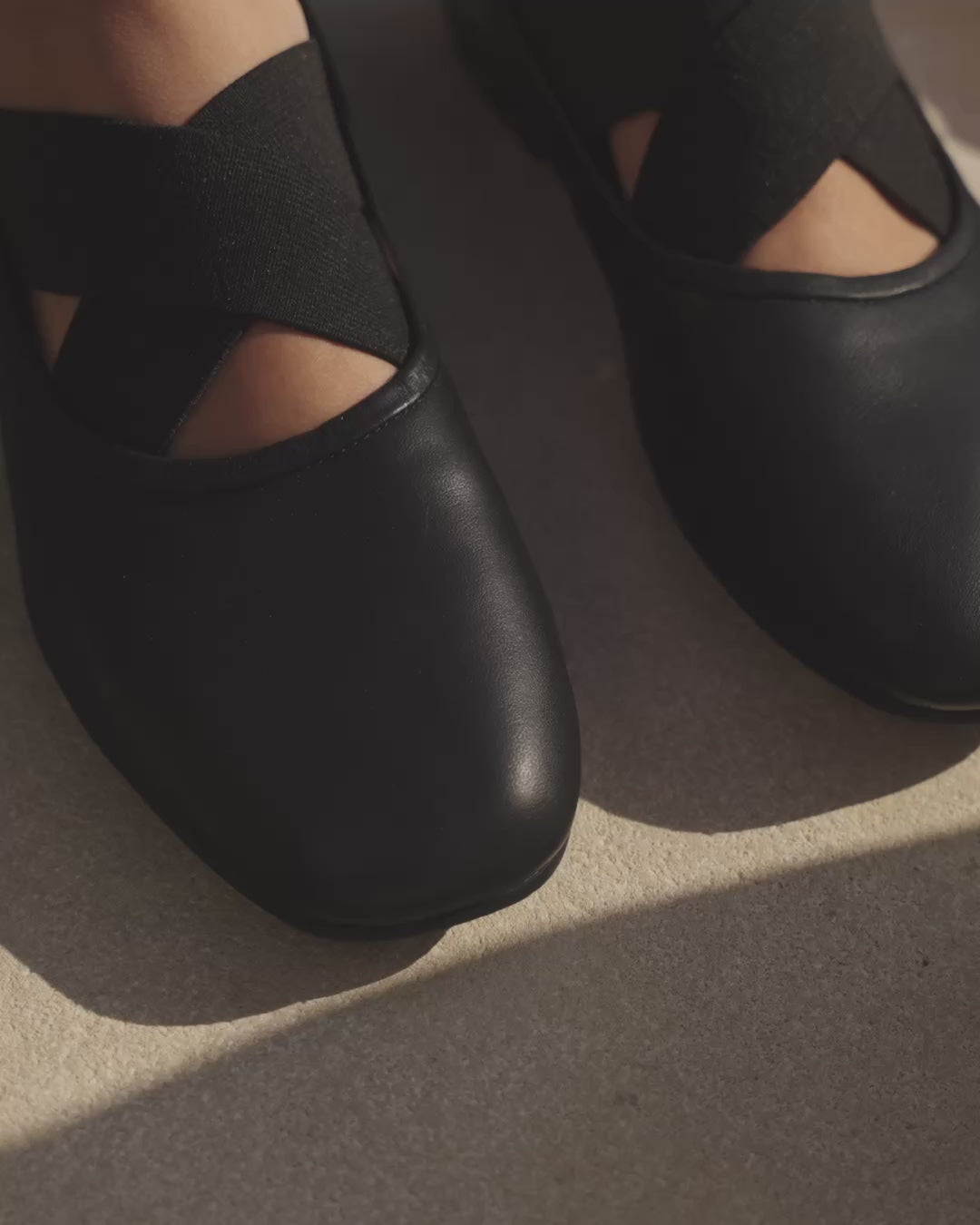 Video of woman wearing Serin leather ballet flats in black