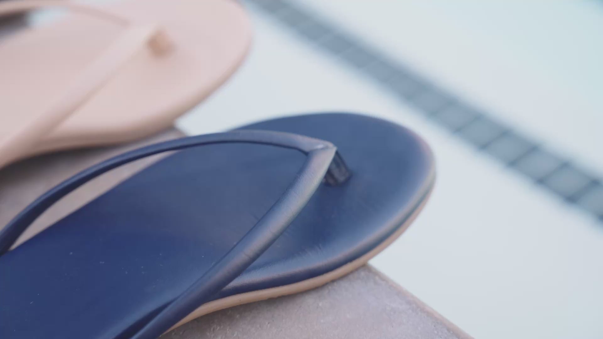 Video of Sunbeam leather flip flop sandals in navy, beach, black